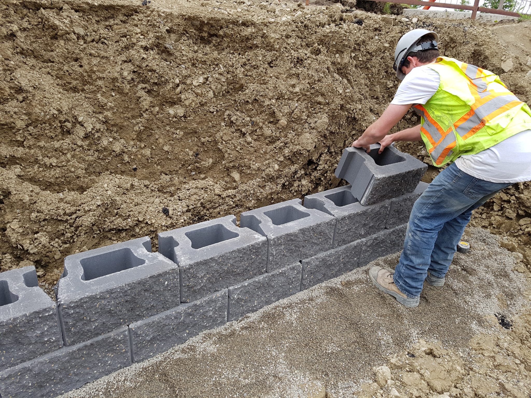 Retaining wall installation in progress